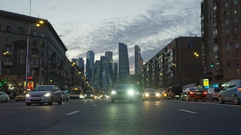 The car rides through the night metropolis Stock Footage 112743555