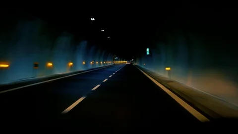Car rides through the tunnel. Driver point-of-view video Stock Footage 90486434