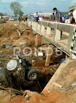 Car in river under bridge after tsunami, khao lak, thailand Stock Photos
