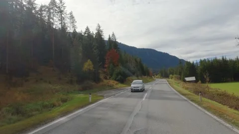 By car on the road in the Alps Stock Footage 223267345