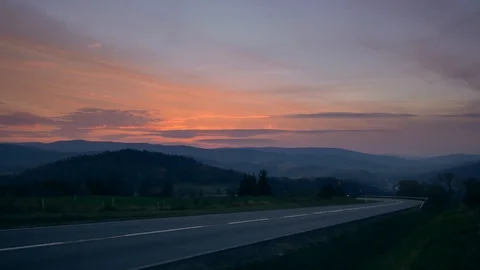 Car on the road between hills. Stock Footage 98743895