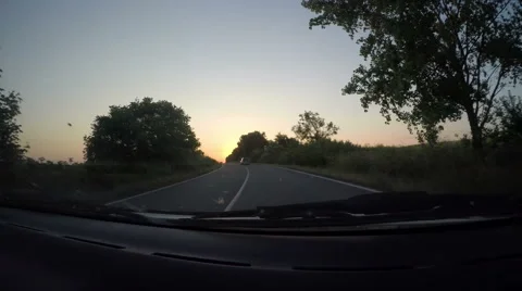 Car on the road during sunset, time lapse Stock Footage 56911401