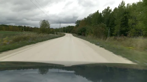 Car on road through countryside Vídeo Stock 237741201