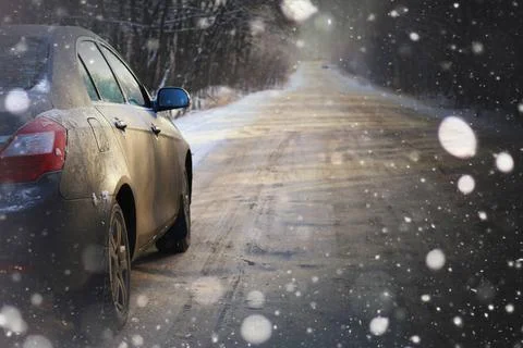 Car on the road in winter dark elements of car in the winter with hoar fro... 写真素材