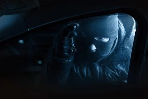 Car robber at night Foto stock