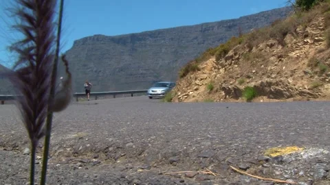 Car Rounding The Corner Of Table Mountain South Africa Low Angle Stock Footage 156765378