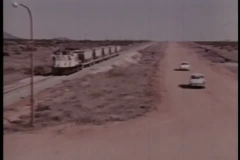 Car running in front of train Stock Footage 11350816