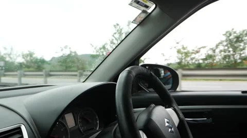 Car running on road without driver, Steering of car Stockbeeldmateriaal 156954222