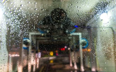 A car Running through automatic car wash. Stock Photos