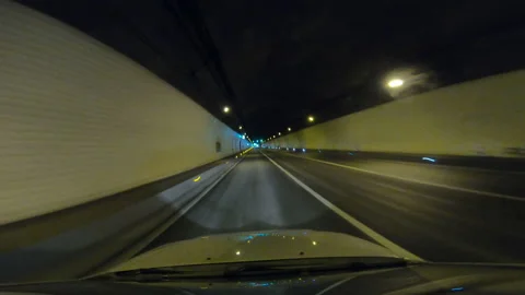 Car running in a tunnel Stock Footage 197012259