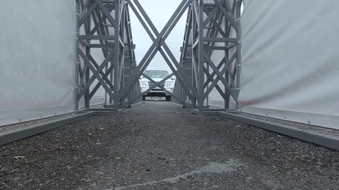 The car runs on a flyover, bottom view Stock Footage 71621923