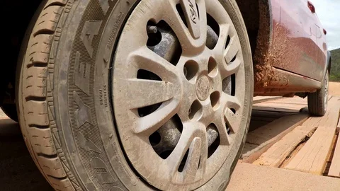 Car on rustic bridge Stock Footage 128077821