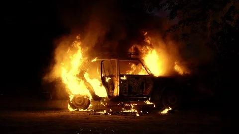 Car sedan on fire side view slow motion 스톡 동영상 115130981