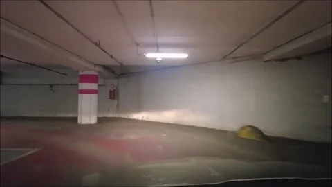 Car seeking parking inside the underground parking lot Stock Footage 295885480