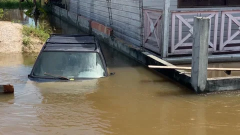 Car is seen parked amid a record level flood in Amazon rivers, Brazil 4K Stock Footage 155029150