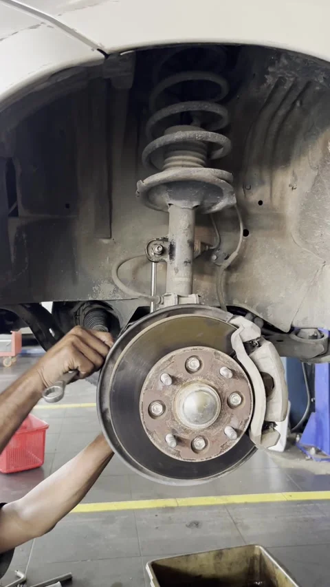 Car Service and Maintenance in Auto Repair Workshop Mechanic Working Close Up Stock Footage 332453783