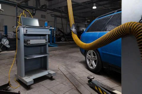Car service interior with a computer for reading electronic errors during the Stock Photos