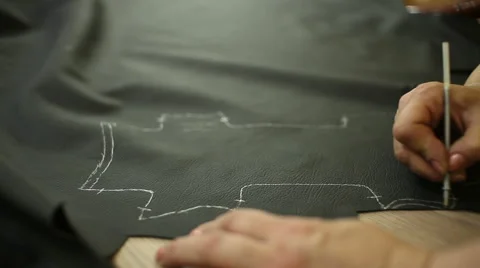 Car service station: creating patterns of leather for the car steering wheel Video stock 52615643