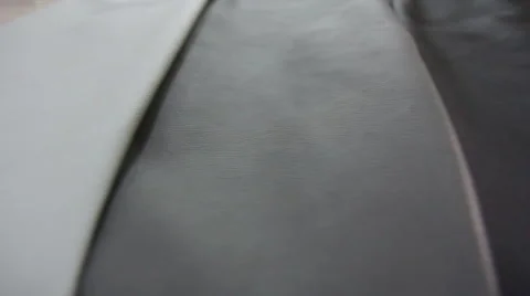 Car service station: patterns of leather for the car steering wheel Video stock 52760323