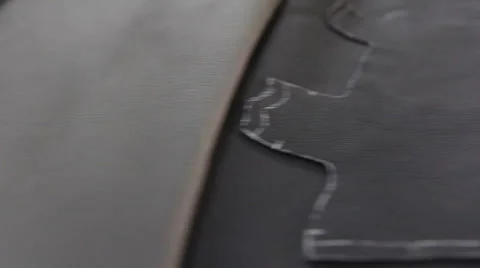 Car service station: patterns of leather for the car steering wheel Video stock 52760366