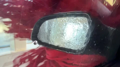 Car Side Mirror and Window Cleaned with Red Brushes in Wash Stock Footage 333050993