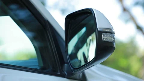Car side mirror automatic opeing in close up frame Stock Footage 159592433