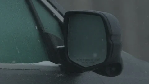 Car Side Mirror Covered In Ice During Snow Stock Footage 302315510