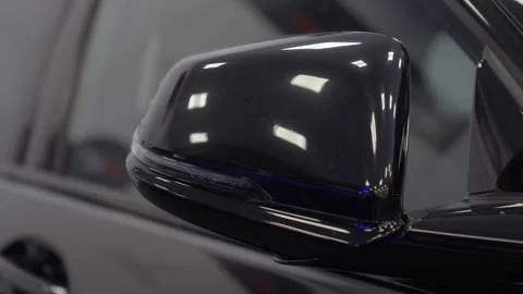 Car side mirror folding automatically. Built-in blue LED turn signal indicator Stock Footage 336367525