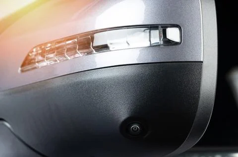 Car side mirror with light and 360 camera lens Stock Photos