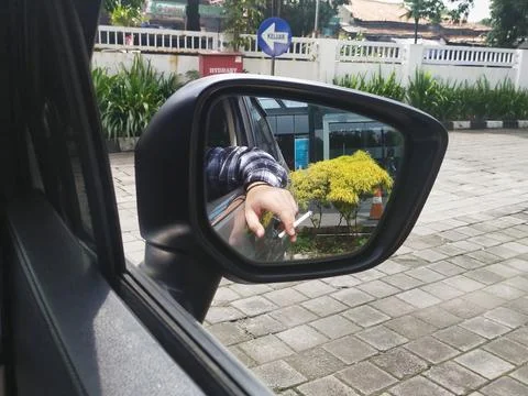 Car side mirror reflection Stock Photos