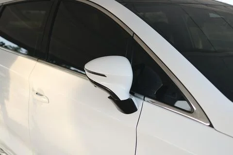 Car side mirror reflection urban garage automotive focus modern setting clo.. Stock Photos