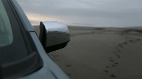 Car side mirror in sand Stock Footage 77053713