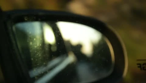 Car side mirror sunset Stock-Footage 10701741