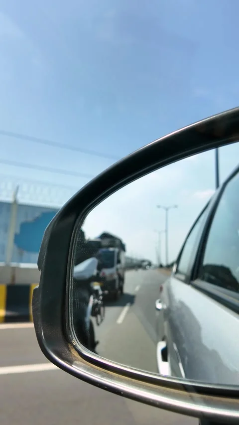 Car Side Mirror View of Highway Traffic Stock Footage 342792594