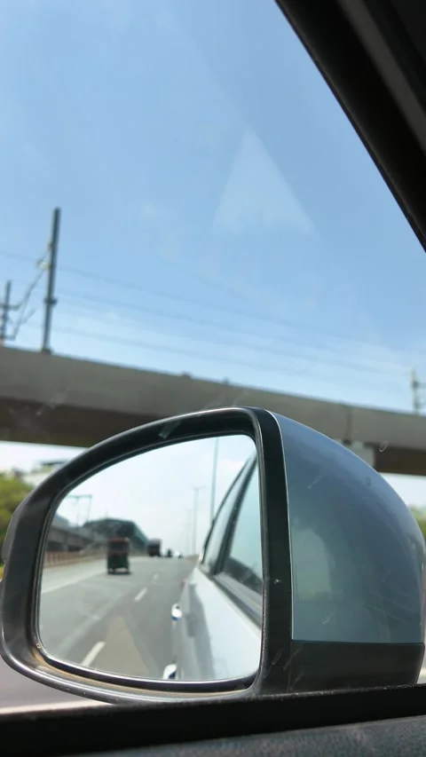 Car Side Mirror View with Rickshaw in Traffic Stock Footage 342792605