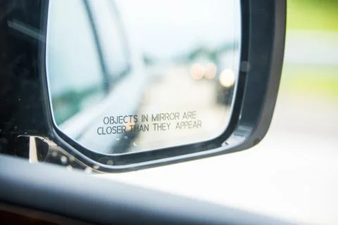 Car side mirror while driving Foto stock