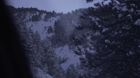 Car Side Window POV Shot Driving Through Snowy Mountains Handheld Adventure Stock-Footage 72880759