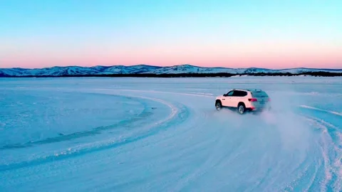 Car Sliding Through Powder Snow on a Frozen Surface Vídeo Stock 344955842