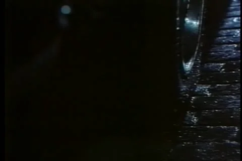Car slowly pulling out of parking spot at night Stock-Footage 11346358