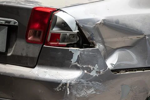 A car with a smashed rear end Stock Photos