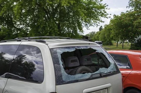 A car with a smashed rear window Stock Photos