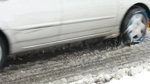Car with snow chains Stock Footage 10739410