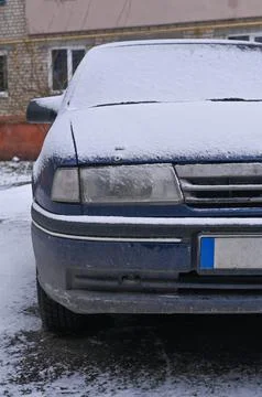 The car is in the snow. vertical Stock Photos