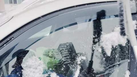A car with snow on the windshield and wipers 스톡 동영상 276719913