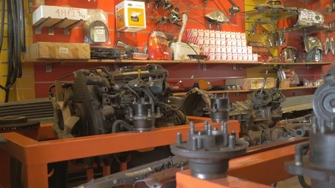Car spare part store engine, headlights and other car body parts. Stock Footage 97243265