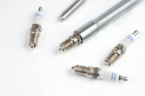 Car spark plug on isolated white background Stock Photos