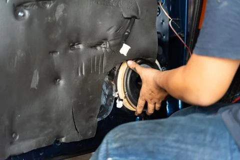 Car speaker installation in door panel Stock Photos