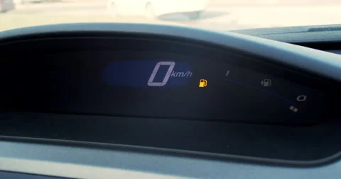 Car speed display, minimum fuel symbol lit. Stock Footage 145928169