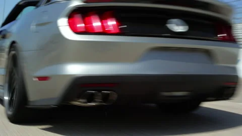 Car speeding and passing on racetrack Stock Footage 191312422