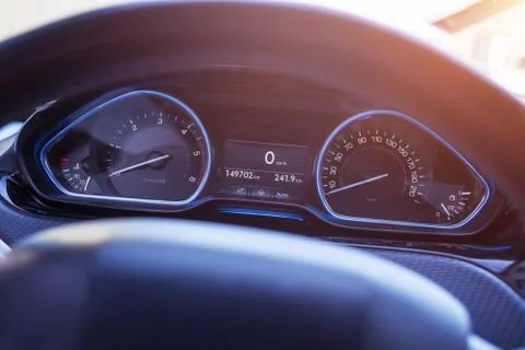 Car speedometer with blue led light. Modern car interior. Stock Photos